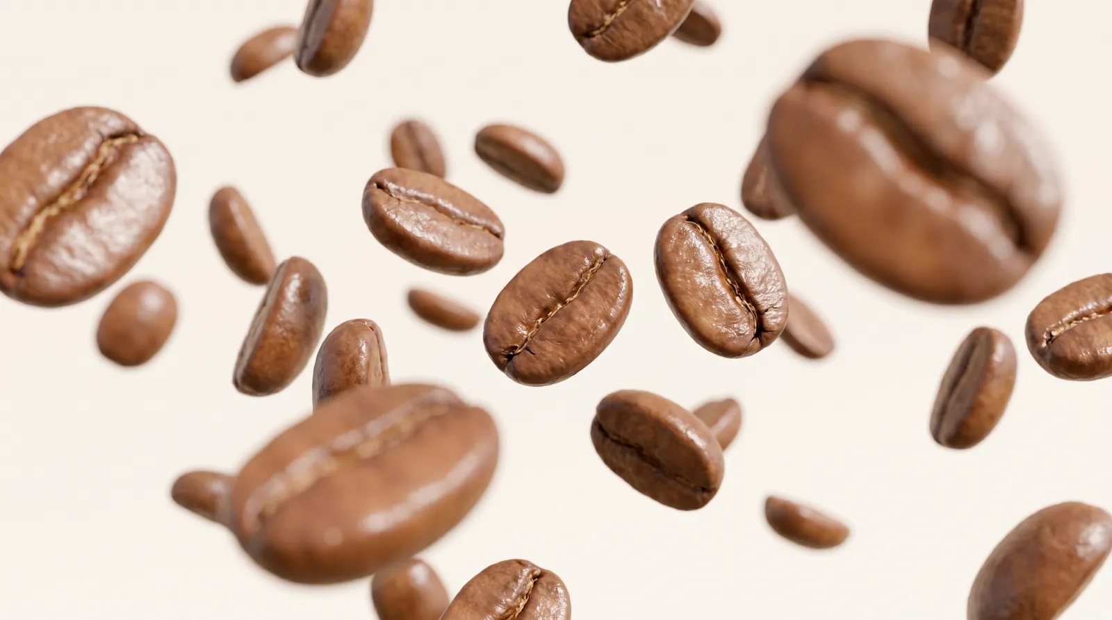Freshly roasted coffee beans tumbling through the air against a soft cream background.